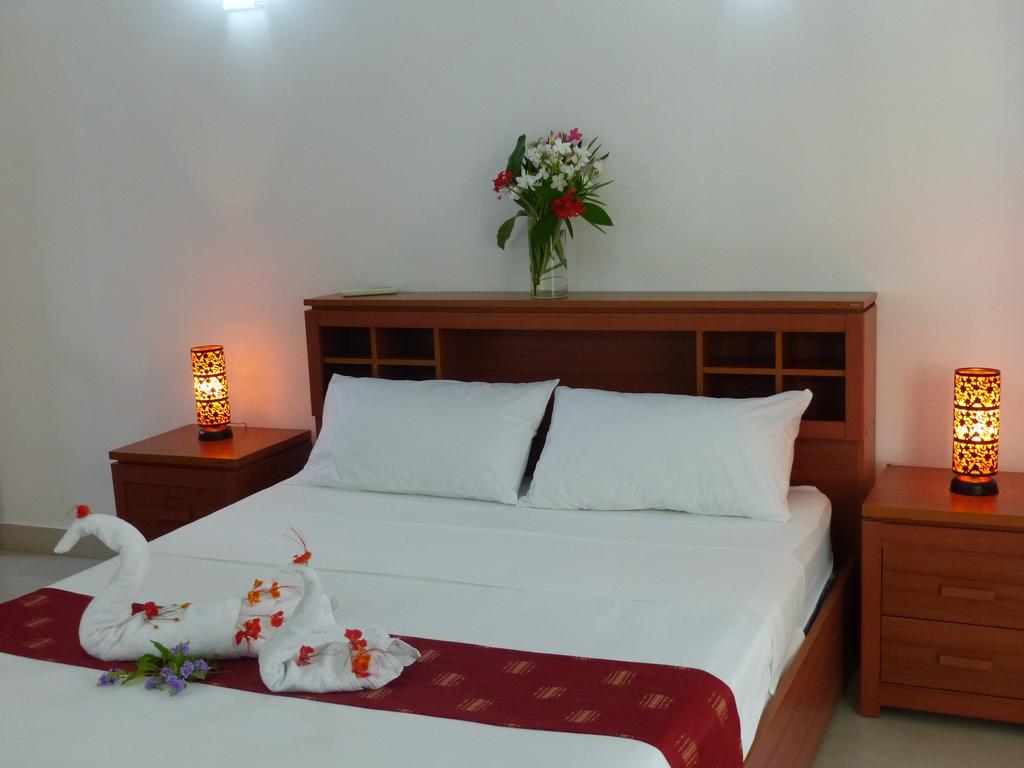 Residence Les Lauriers Grand Baie Quarto foto