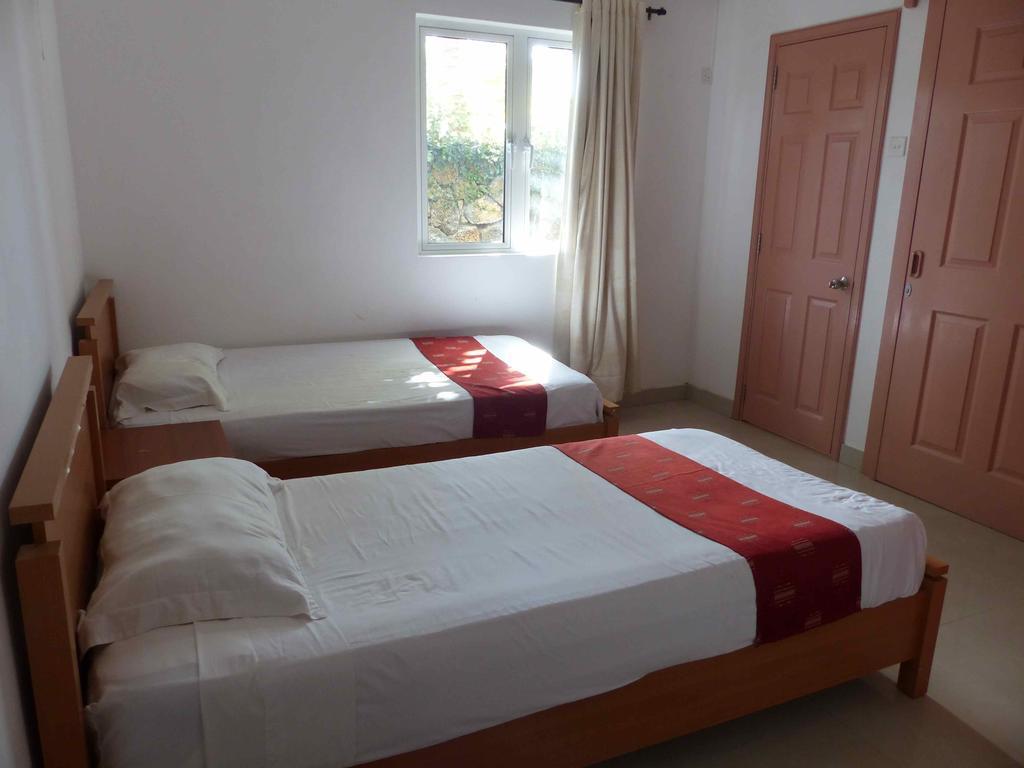 Residence Les Lauriers Grand Baie Quarto foto